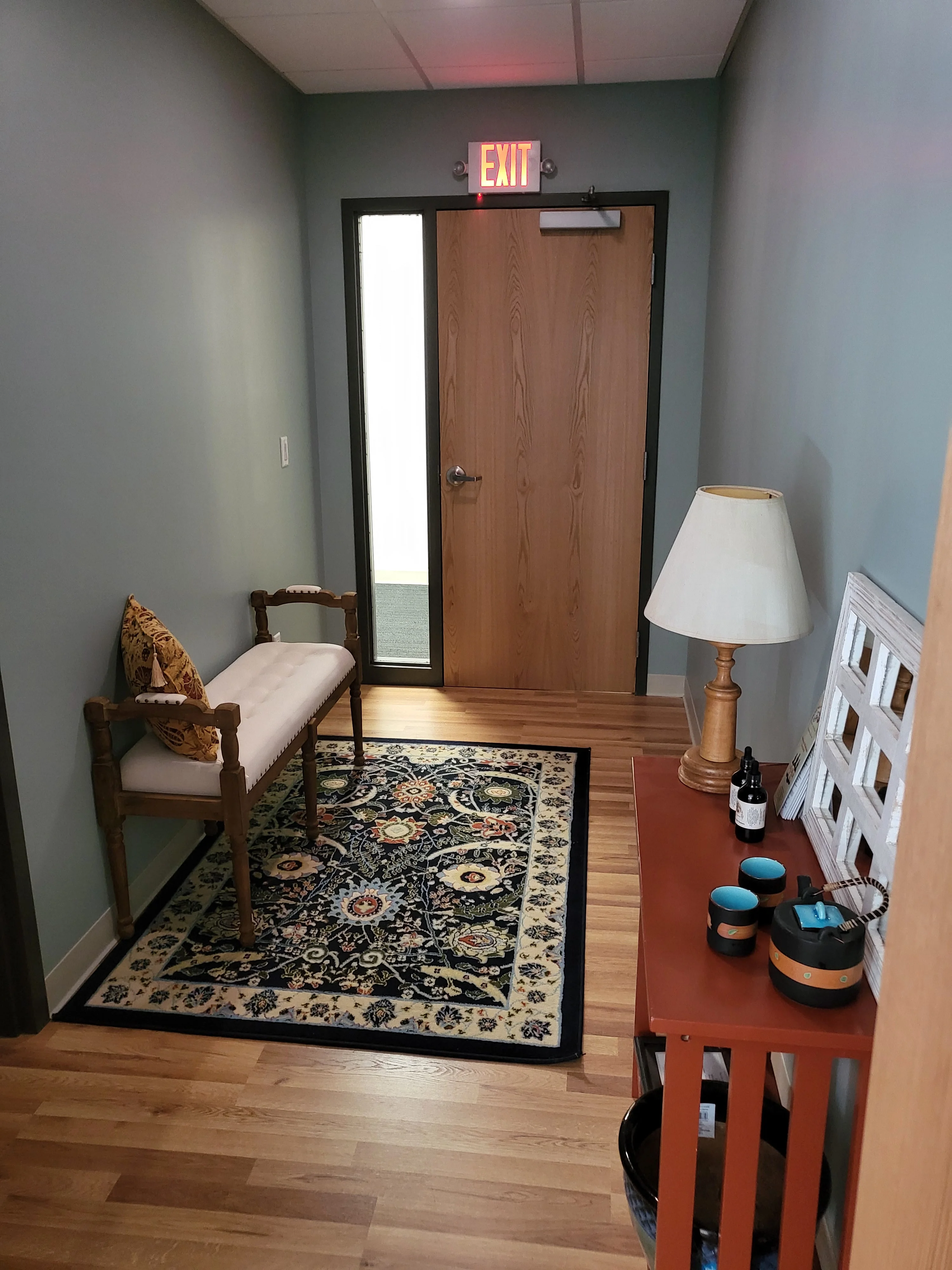 Massage Ithaca office space interior - comfortable waiting area and treatment facilities